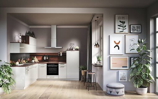 Auch auf kleinem Raum lässt sich eine L-Planung umsetzen, in der offenen wie in der geschlossenen Küche.